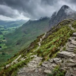 Dramatic view of Snowdon Yr Wyddfa with the Pyg Track trail winding up the mountainside